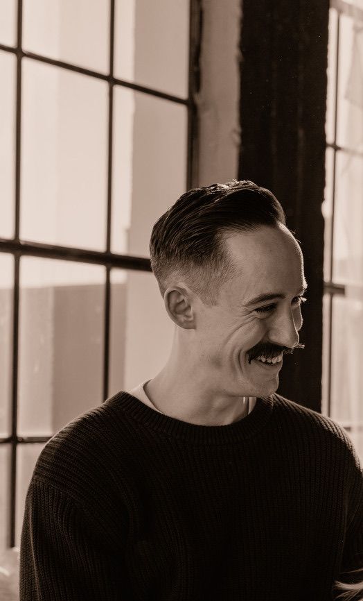 Sam, the owner of Mural City Web Design